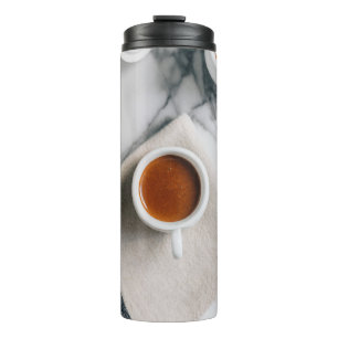 BOUTEILLES ISOTHERMES TEACUP CÉRAMIQUE BLANC REMPLI DE LIQUIDE ROUGE