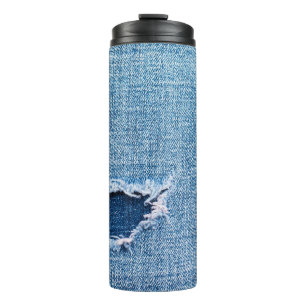 Bouteilles Isothermes Tissu en denim déchiré, teintes bleues.