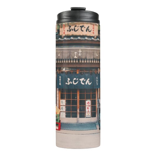 BOUTEILLES ISOTHERMES TROIS BICYCLETTES PARKÉES DEVANT L'ÉDIFICE (Devant)