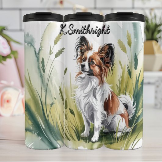 Bouteilles Isothermes Un chien papillon en haute herbe