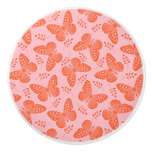 Bouton De Porte En Céramique Motif papillon orange sur arrière - plan rose