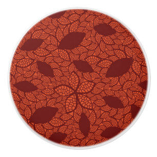 Bouton De Porte En Céramique Motif rouge de feuille sur l'orange