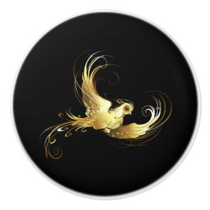 Bouton De Porte En Céramique Oiseau d'or sur Arrière - plan noir
