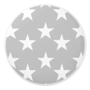 Boutons en céramique gris et blancs de profil sous