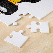 Bouwmachine voor zwart-wit en geel legpuzzel (Zijkant)