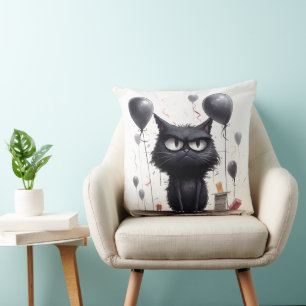 Boze zwarte kat en ballonnen kussen