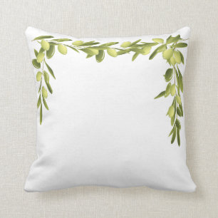 Branche d'olivier sur le coussin de vert d'olives