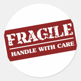 Breekbaar handvat met zorgartikel ronde sticker