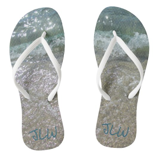 Breken van de golven met initialen teenslippers (Voetbed)