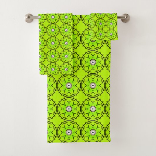 Bright green towel with intricate circular pattern bad handdoek (Insitu)