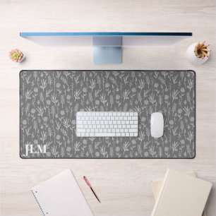 Brindilles blanches simples sur un monogramme gris