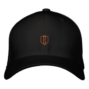 Brodée Casquette en laine Flexfit noire avec monogramme E