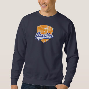 Brooklyn Schild met Swoosh Design Trui