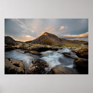 BROWN MOUNTAIN NEAR BODY OF WATER ONDER CLOUDY SKY POSTER