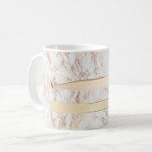 Brucelles d'or sur la tasse de marbre rose (Devant gauche)