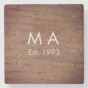 Bruin rustieke baksteen voeg naam letter jaardatum stenen onderzetter