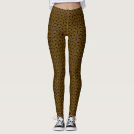 Bruine achtergrond met zwarte pijlachtige patronen leggings