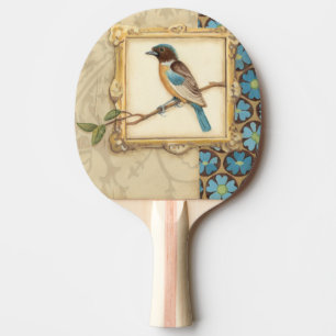 Bruine en blauwe vogel op een bijkantoor die omhoo tafeltennisbatje