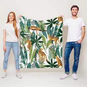 Bruine luipaard in tropisch spoelblad van oerwoud fleece deken