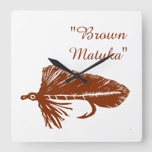 Bruine matuka-wimpel voor vliegkoppeling en -visse vierkante klok