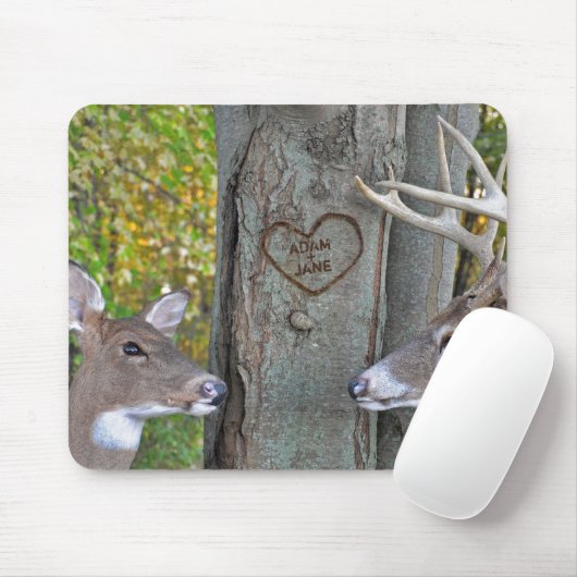 buck and do by carved hart on tree muismat (Met muis)