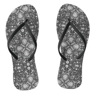 Bugs, gebroken wit op zwart teenslippers