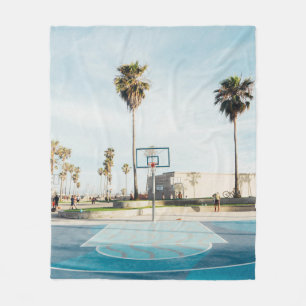 Buitengaan van basketbal fleece deken