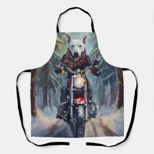 Bull Terrier-hond rijdt op motorfiets met Kerstmis Schort