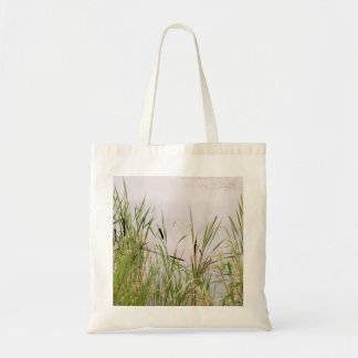 Bulrushes met water. tote bag