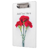 bundel rode anjerbloemen klembord (Links)