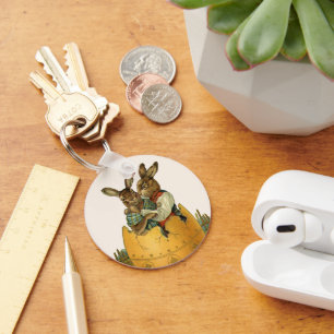 Bunnies in een gouden ei,  Victoriaans Pasen Sleutelhanger