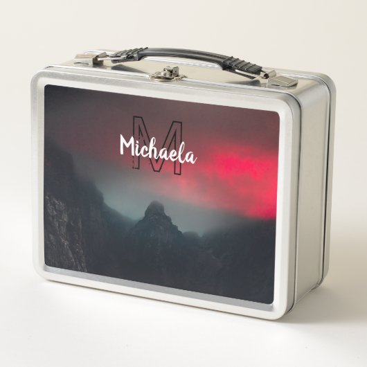 Burning clouds, fog and mountains monogram in sky (Voorkant)