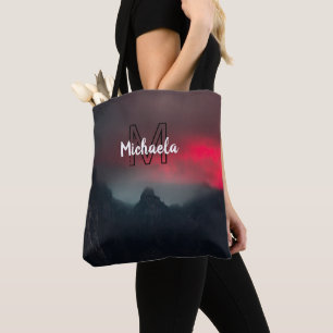 Burning clouds, fog and mountains monogram in sky draagtas