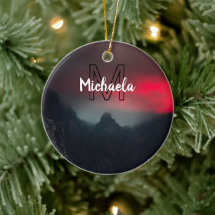Burning clouds, fog and mountains monogram in sky keramisch ornament