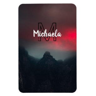 Burning clouds, fog and mountains monogram in sky magneet