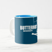Butternut Ski Resort Skier Tweekleurige Koffiemok (Voorkant links)