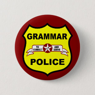 Button van de politie van Grammar