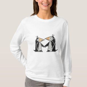 C.A. pingouins de bande dessinée tenant le T-shirt