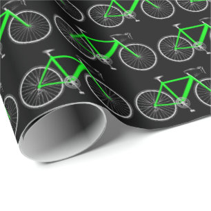 Cadeau bicyclette verte sur papier d'emballage noir
