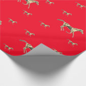 Cadeau Chevaux d'or sur le papier rouge d'emballage (Coin)