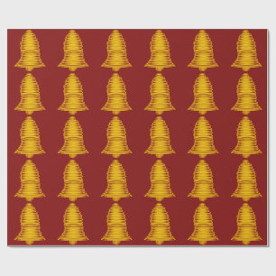 Cadeau Cloches d'or sur papier d'enveloppement rouge fonc