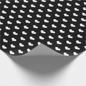 Cadeau coeurs blancs sur papier d'emballage noir (Coin)