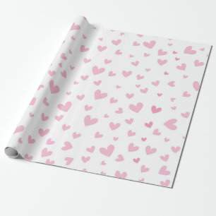 Cadeau Coeurs roses enveloppant du papier