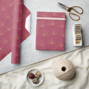 Cadeau Fleurs dorées sur papier de soie rose foncé pour m