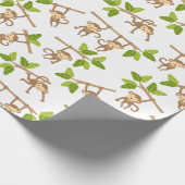 Cadeau Jouer des singes enveloppant du papier (Coin)