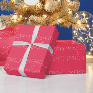 Cadeau Joyeux rose et papier d'enveloppement brillant