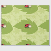 Cadeau Ladybug Sur Un Papier D'Enveloppement De La Feuill (Plat)