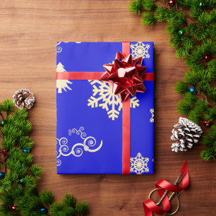 Cadeau Papier de Noël bleu avec flocons de neige en crème