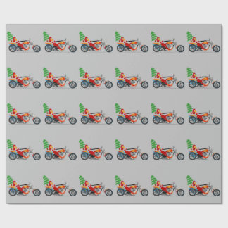 Cadeau Père Noël sur un papier d'emballage de moto