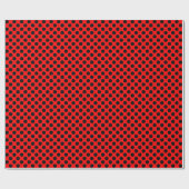 Cadeau Point Polka noir sur papier à envelopper rouge (Plat)